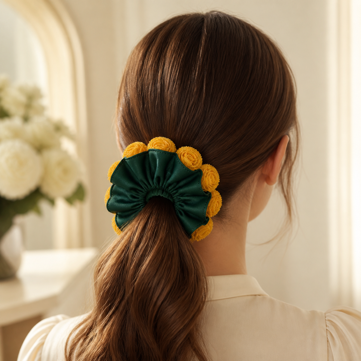 Emerald satin and yellow floral convertible scrunchie styled in a ponytail