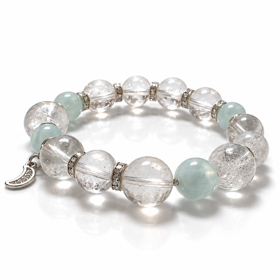 Clear and pale aqua beaded bracelet with a silver-tone crescent moon charm.