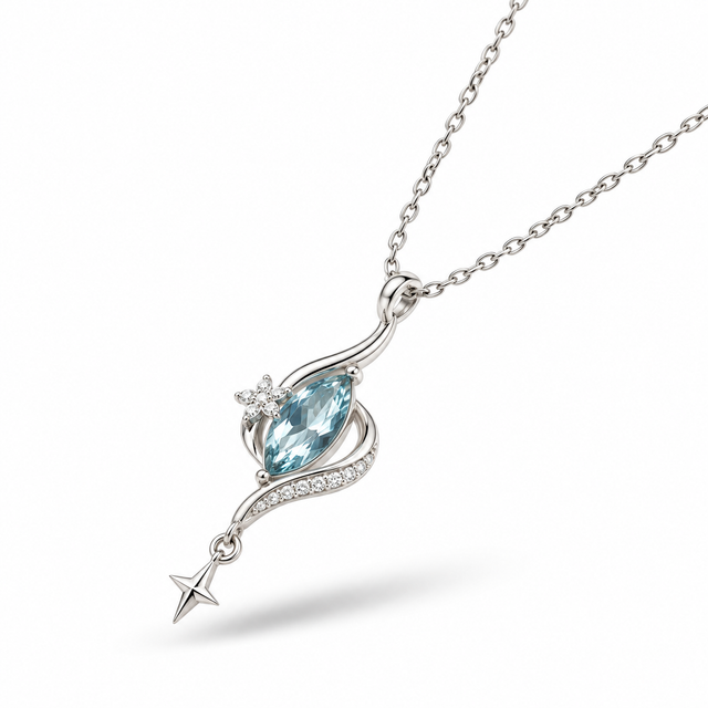 Angled front view of the aqua teardrop pendant and star drop.