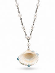 Back view of the white scallop shell pendant on a pearl chain.