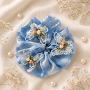Blue organza butterfly pearl oversized scrunchie flat lay