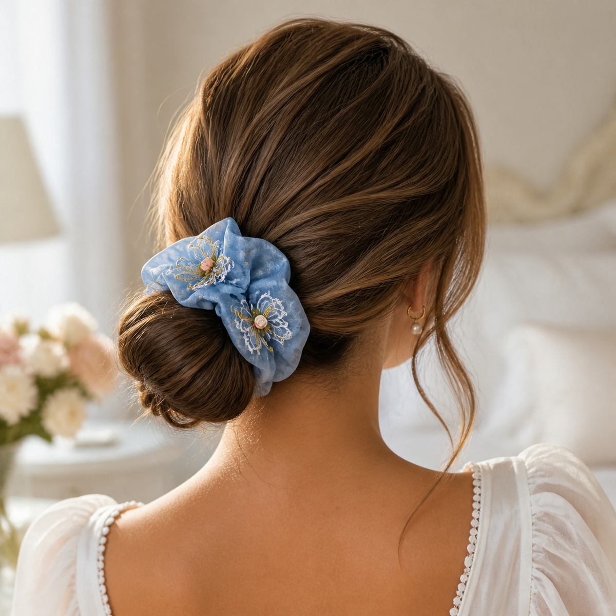 Blue organza butterfly pearl oversized scrunchie styled in a low bun