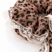 Brown leopard-print chiffon and ivory lace texture detail