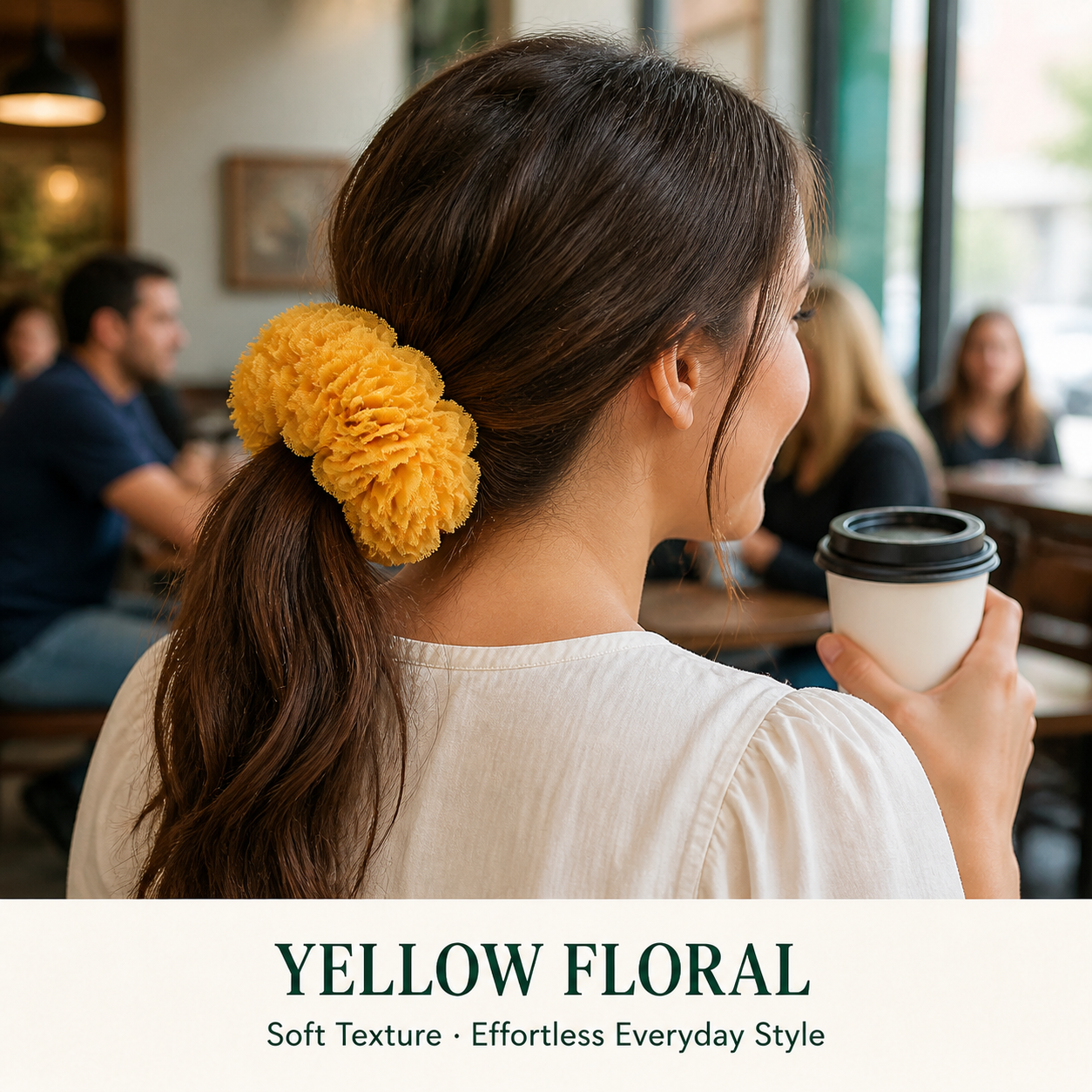 Yellow floral scrunchie from the convertible set styled around a low ponytail