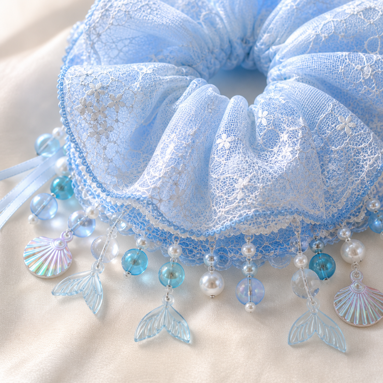 Ice blue lace pearl and mermaid charm scrunchie detail