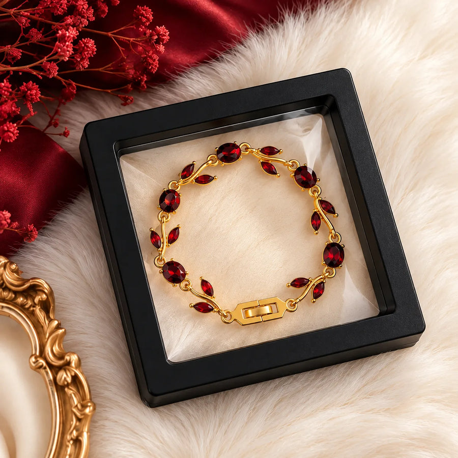 Red leaf bracelet presented in a black window gift box